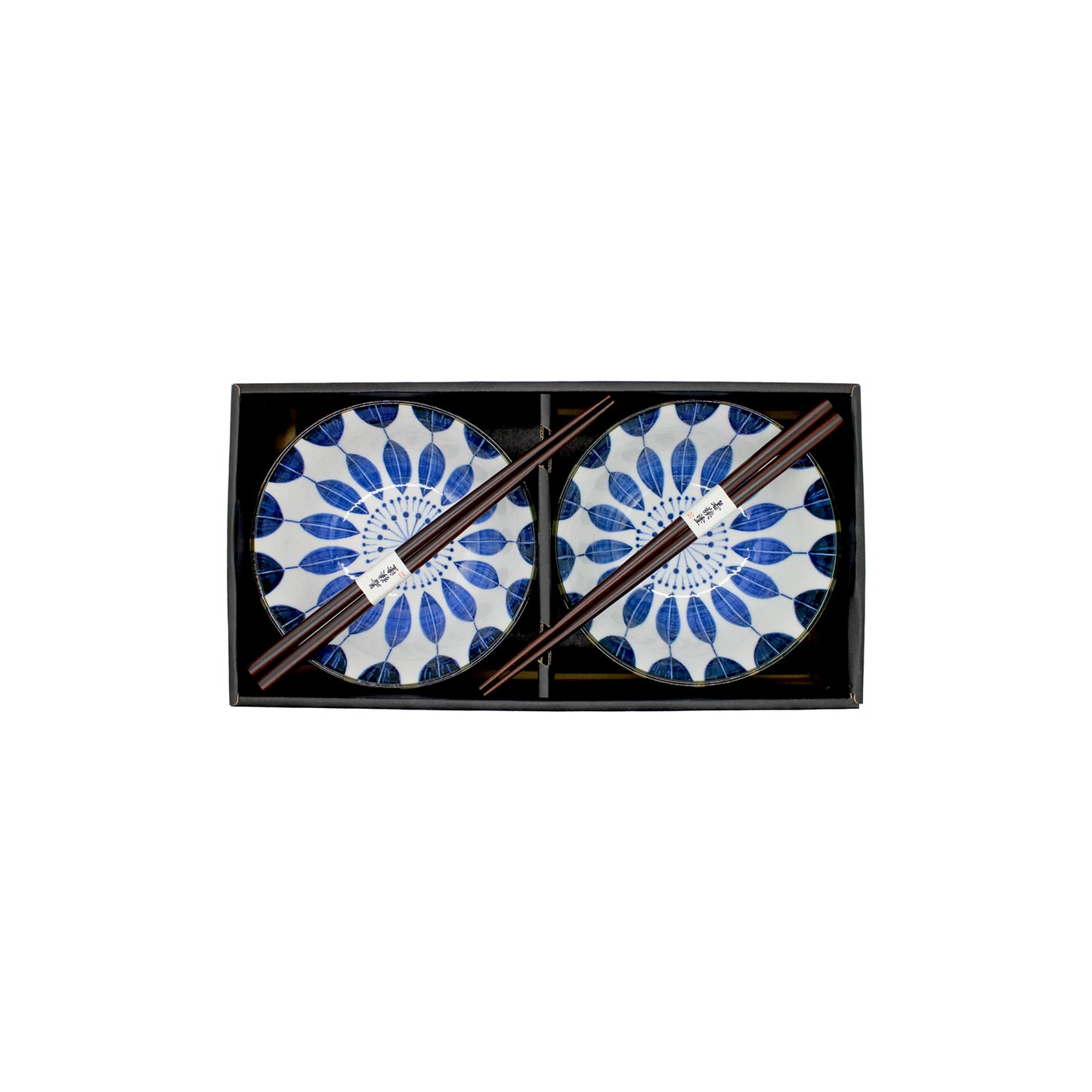 
                  
                    The Sunflower Design Bowls Boxed Set - White & Blue features two ceramic bowls with a Japanese sunflower motif, each paired with brown chopsticks, elegantly arranged in a sleek black gift box.
                  
                