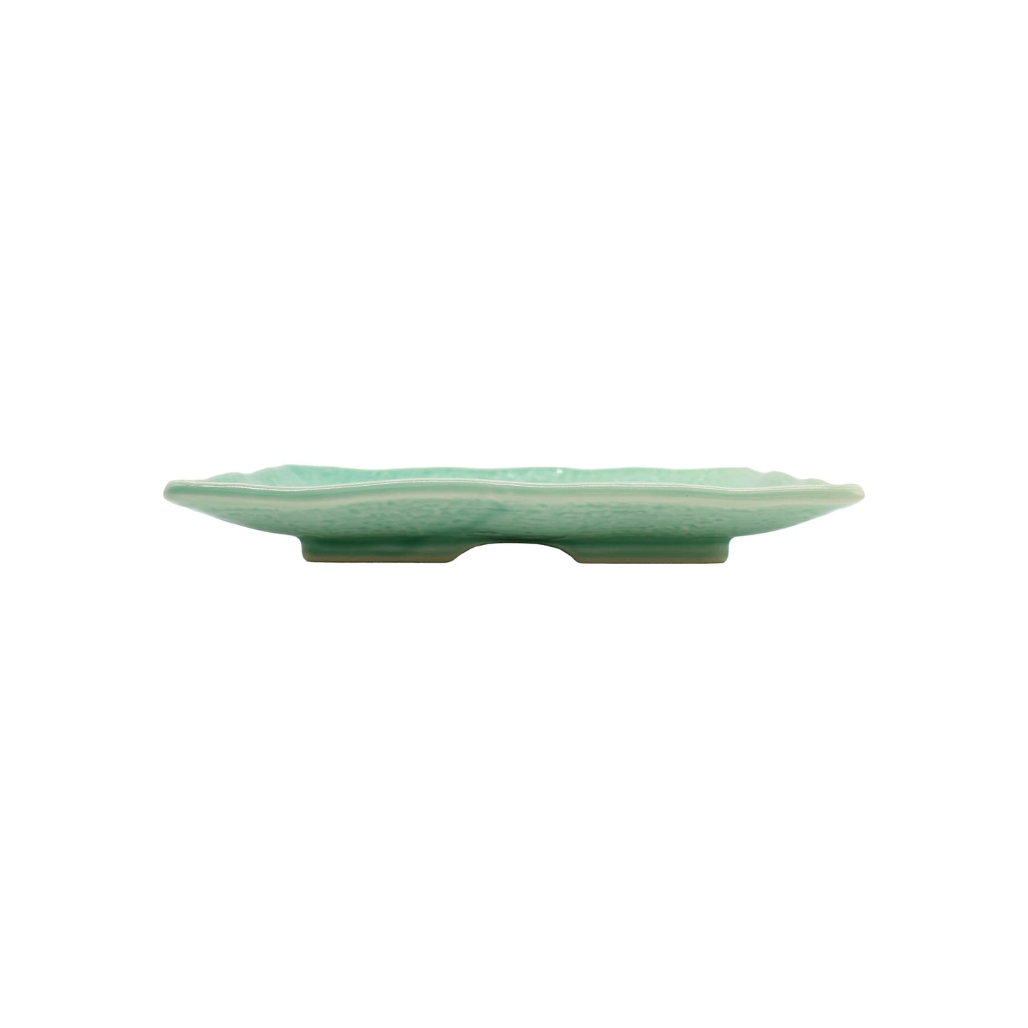 
                  
                    The Sushi Plate - Celadon Green is a flat, round celadon ceramic dish with a scalloped edge, shown from the side on a white background. It’s inspired by Japanese culture and crafted in traditional Minoyaki porcelain style.
                  
                
