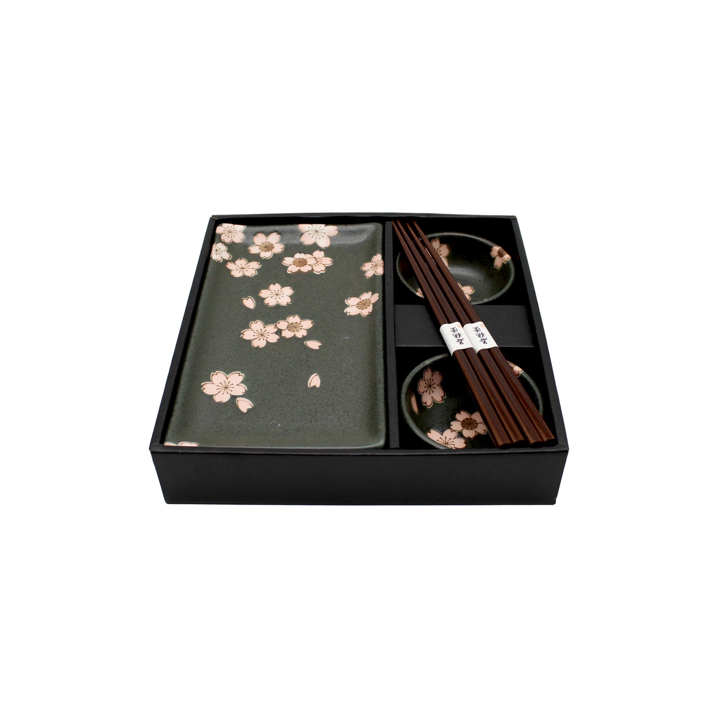 The Sushi Gift Set - Black & Pink Sakura Design includes a rectangular plate, two small bowls, and two pairs of chopsticks, all featuring an elegant cherry blossom pattern.