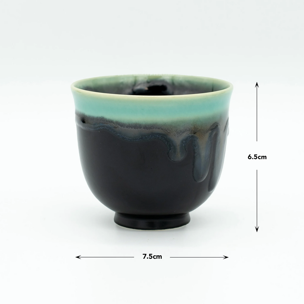 
                  
                    Black & Turquoise Teacup
                  
                