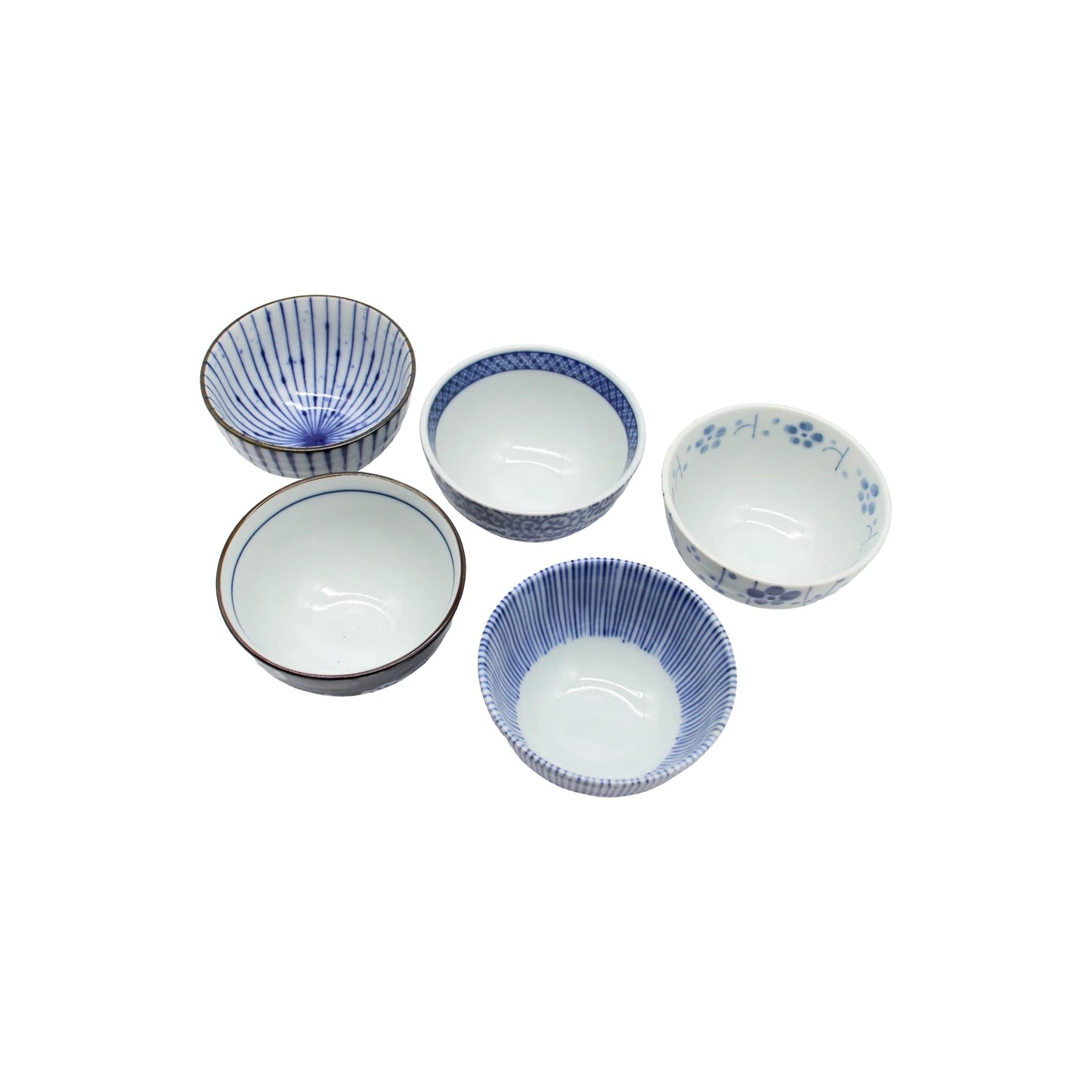 
                  
                    Five small indigo blue Japanese ceramic teacups from the 5 Piece Japanese Teacup Gift Set - Aizome, featuring various patterns.
                  
                