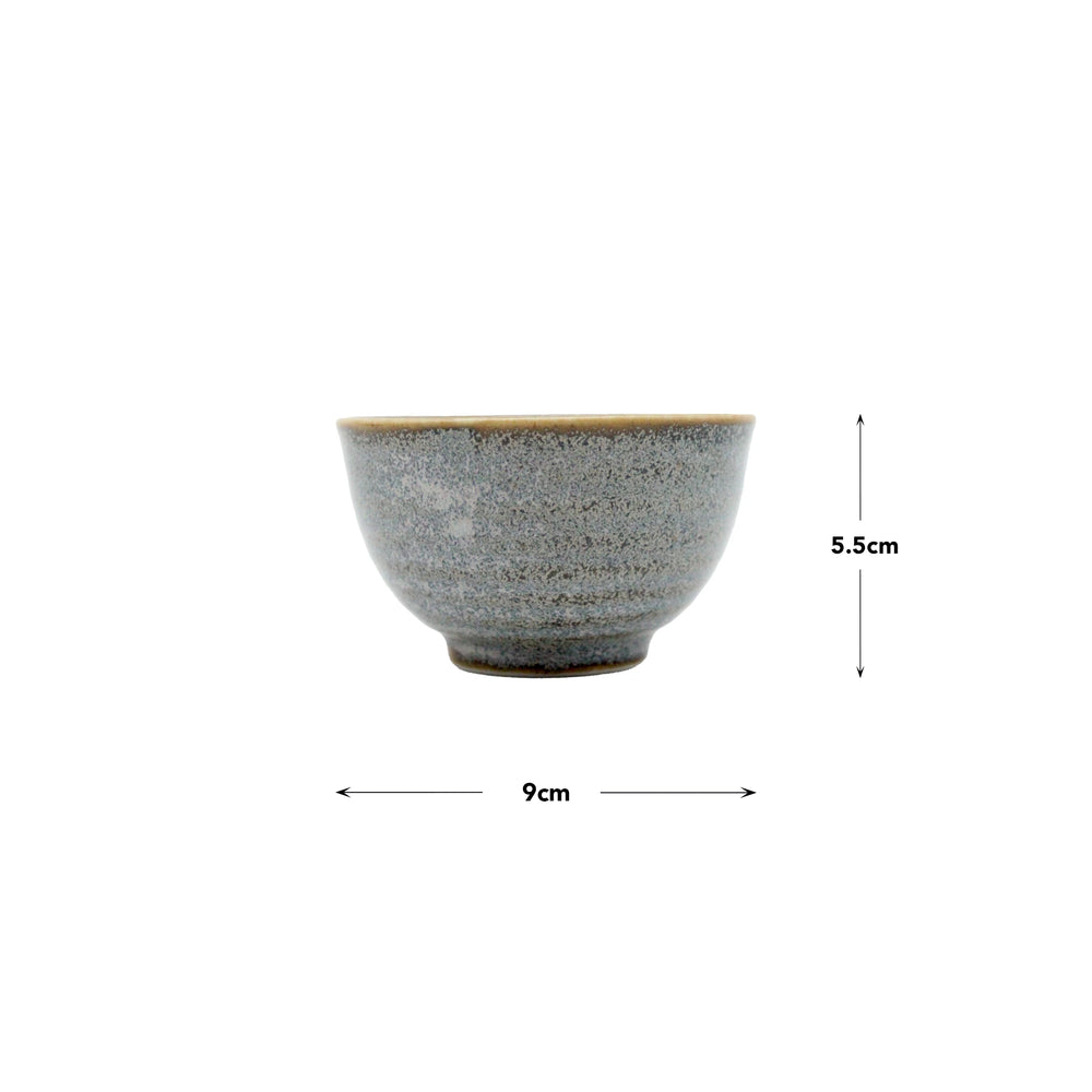 The Tea Cup - Steel Grey features Minoyaki porcelain with a speckled grey finish, measuring 9 cm in diameter and 5.5 cm in height—ideal as Japanese ceramic ware or a handmade tea cup.