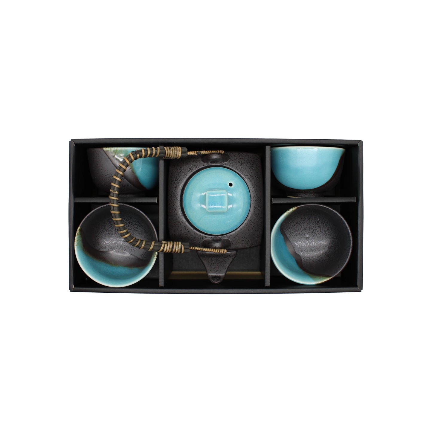 A black box contains the Tea Gift Set for Four - Sky Blue and Grey: a Minoyaki porcelain teapot with a wrapped handle, plus four matching cups, each in its own compartment.