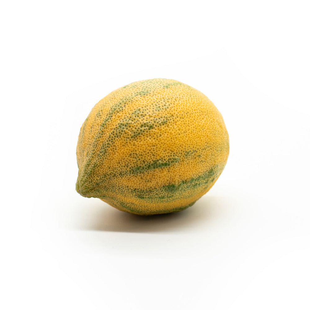 
                  
                    A Fresh Tiger Lemon, yellow with green stripes and high in vitamin C, is displayed on a plain white background.
                  
                