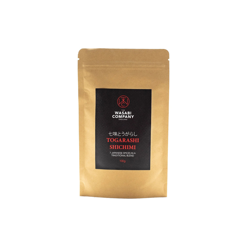 A brown resealable pouch labeled Wasabi Label Togarashi Shichimi Spice Mix 100g on a plain white background.
