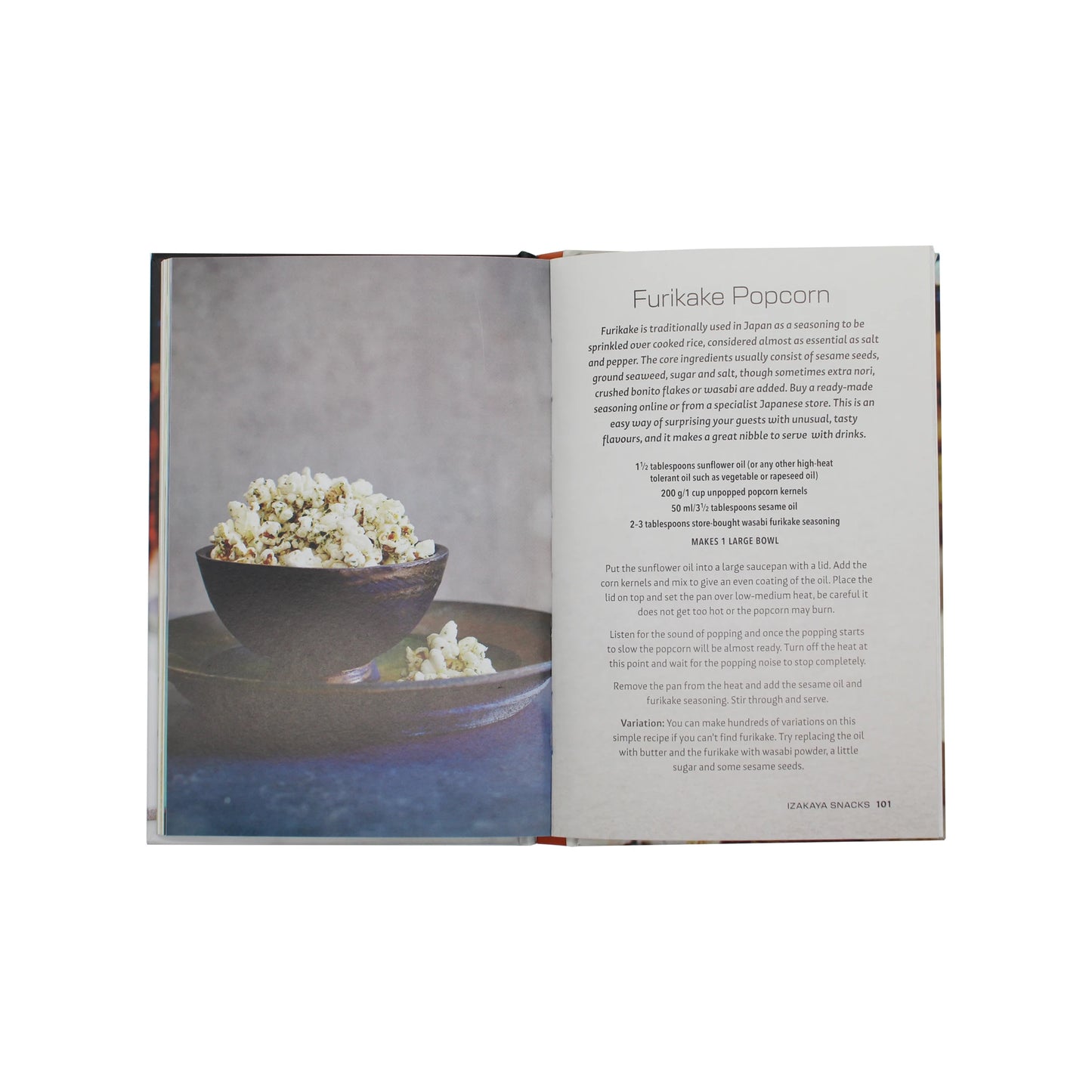 
                  
                    Open cookbook page from Tokyo Bar - 65 Recipes For Japanese Style Cocktails & Izakaya Snacks titled Furikake Popcorn, featuring a recipe and a bowl of popcorn reminiscent of izakaya snacks.
                  
                