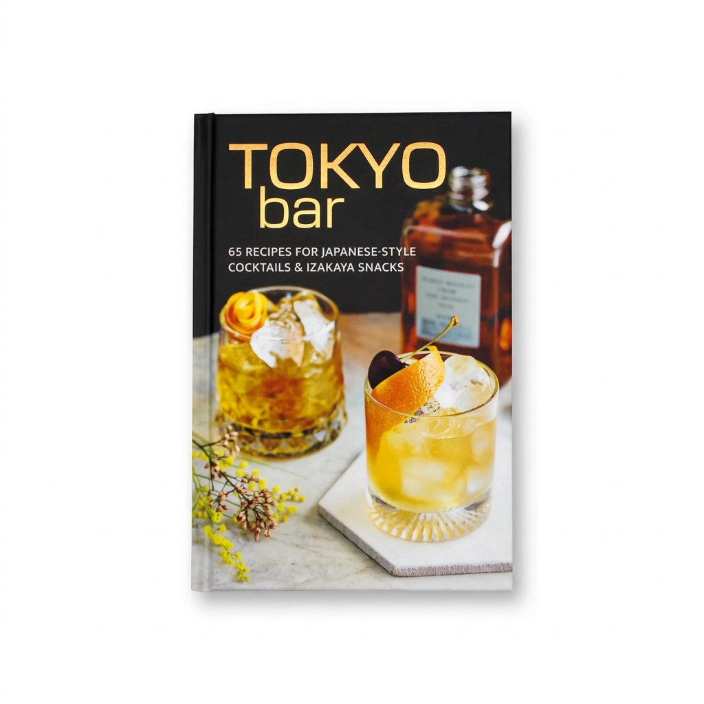 Hardcover book titled Tokyo Bar - 65 Recipes For Japanese Style Cocktails & Izakaya Snacks, featuring photos of Japanese cocktails on the cover.
