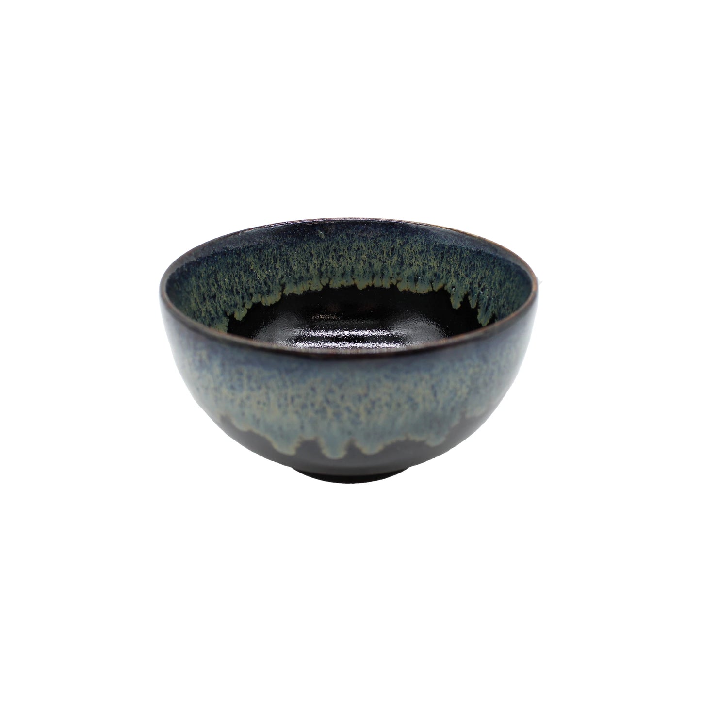 The Miso Bowl - Black Cascade features a dark blue and green reactive glaze with a textured interior and smooth, rounded edges.