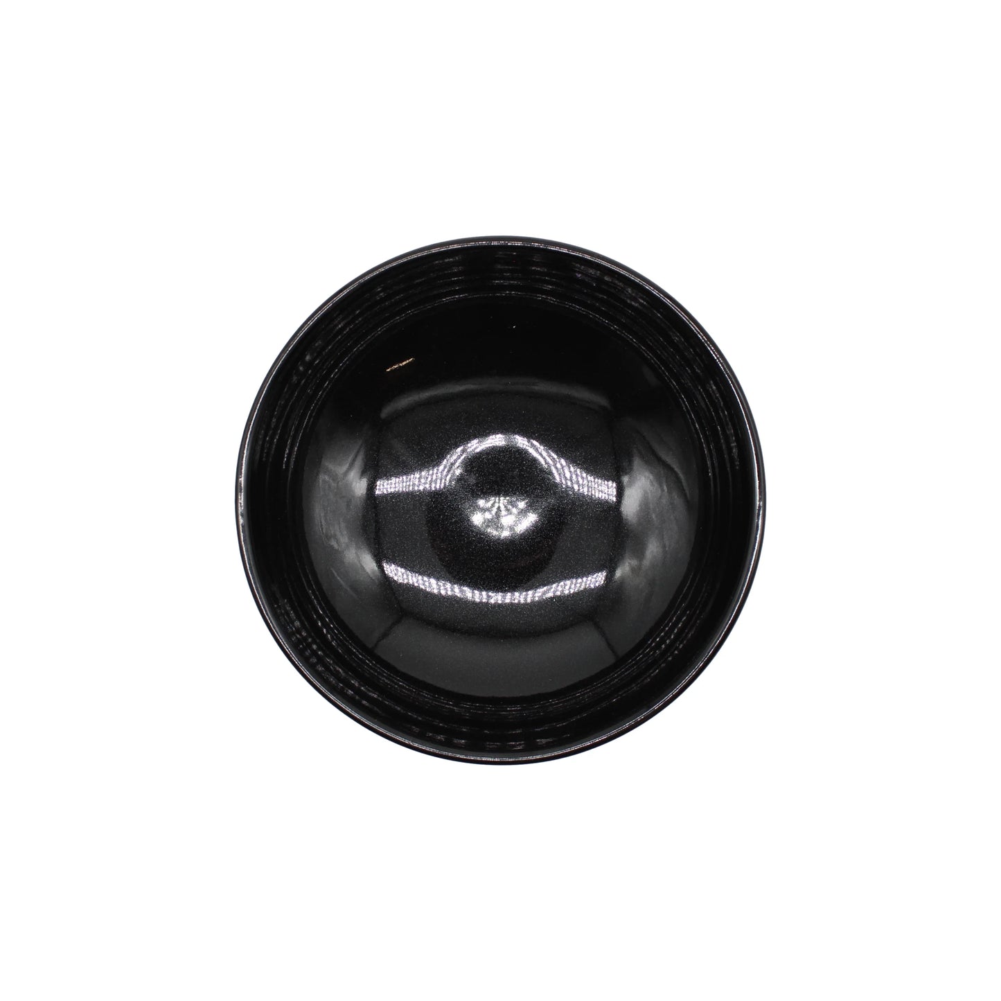 
                  
                    A handmade Shallow Earthenware Bowl - Black Glaze, crafted from Iga clay in Japan, shown from above on a white background with light reflecting inside its smooth, round surface.
                  
                