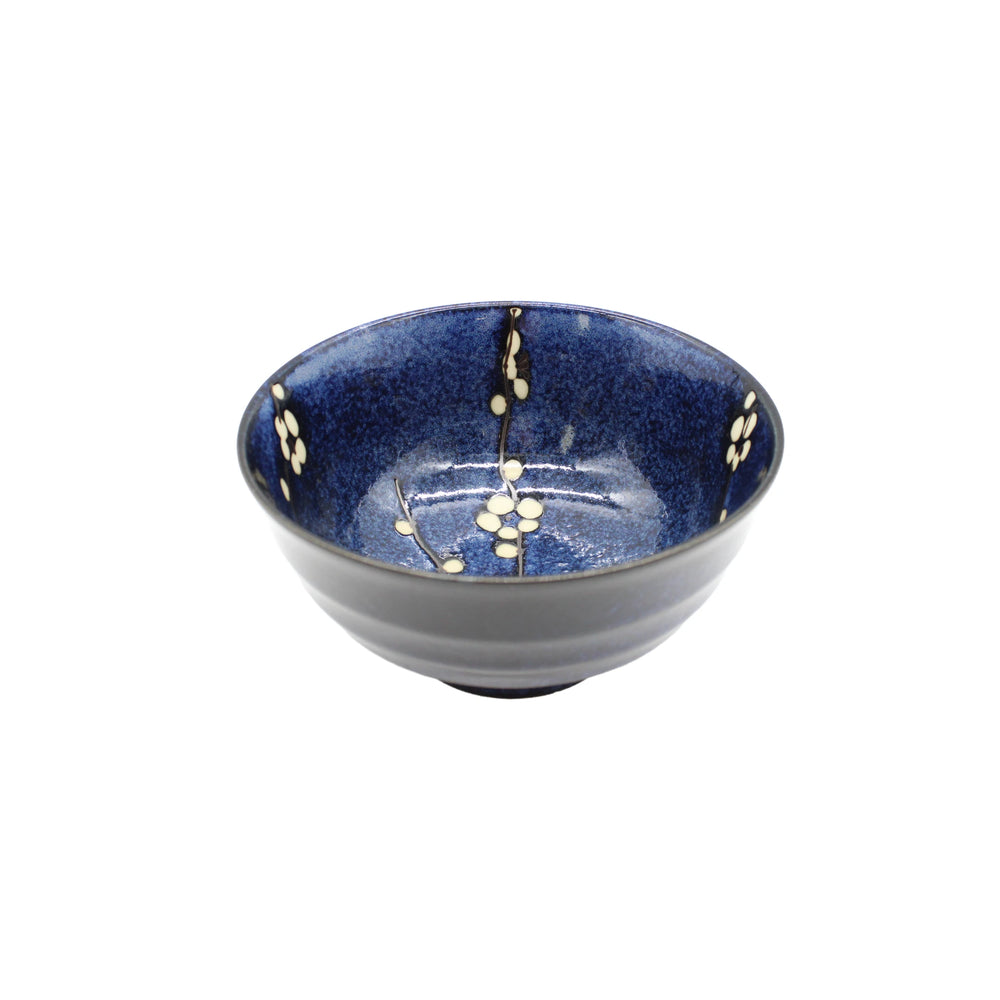 The Udon Bowl - Blue Cherry Blossom features a glossy blue porcelain finish with a delicate white cherry blossom design inside, shown against a plain white background.