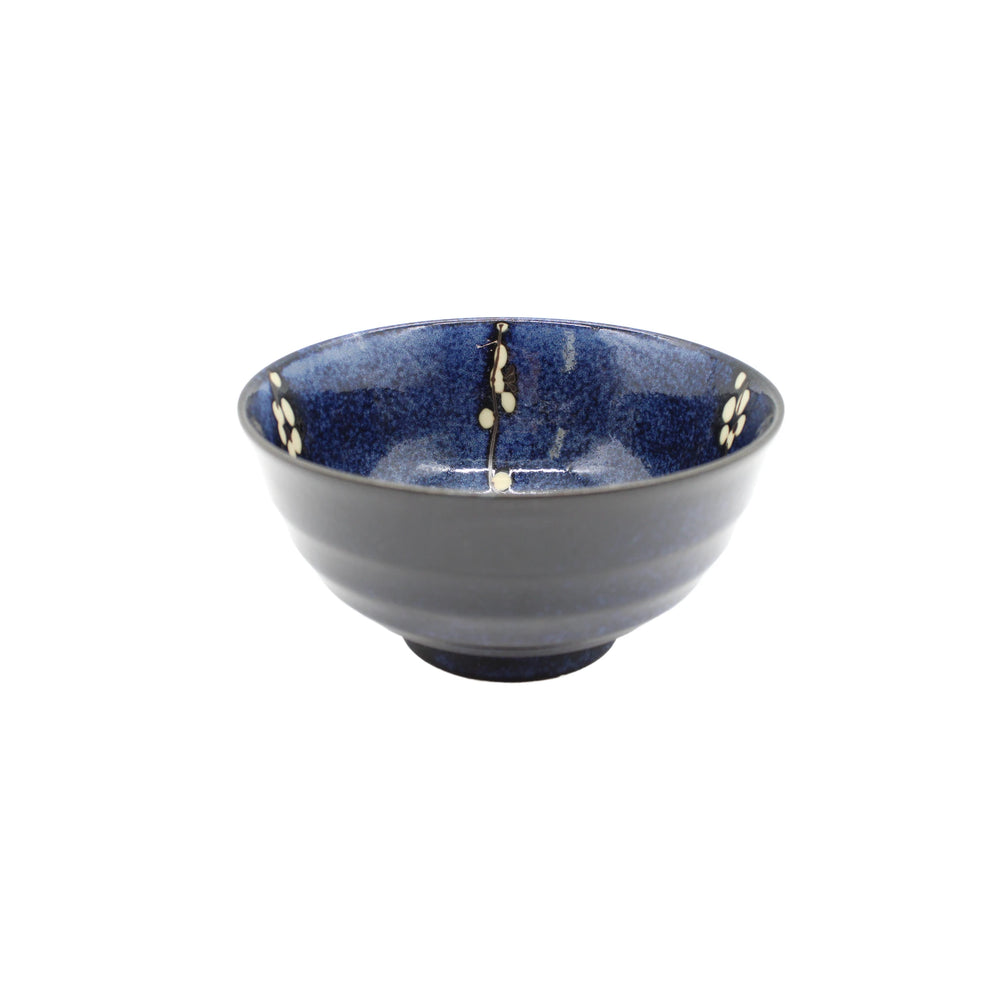 
                  
                    The Udon Bowl - Blue Cherry Blossom features blue glaze and a cream cherry blossom design inside, displayed against a white background.
                  
                