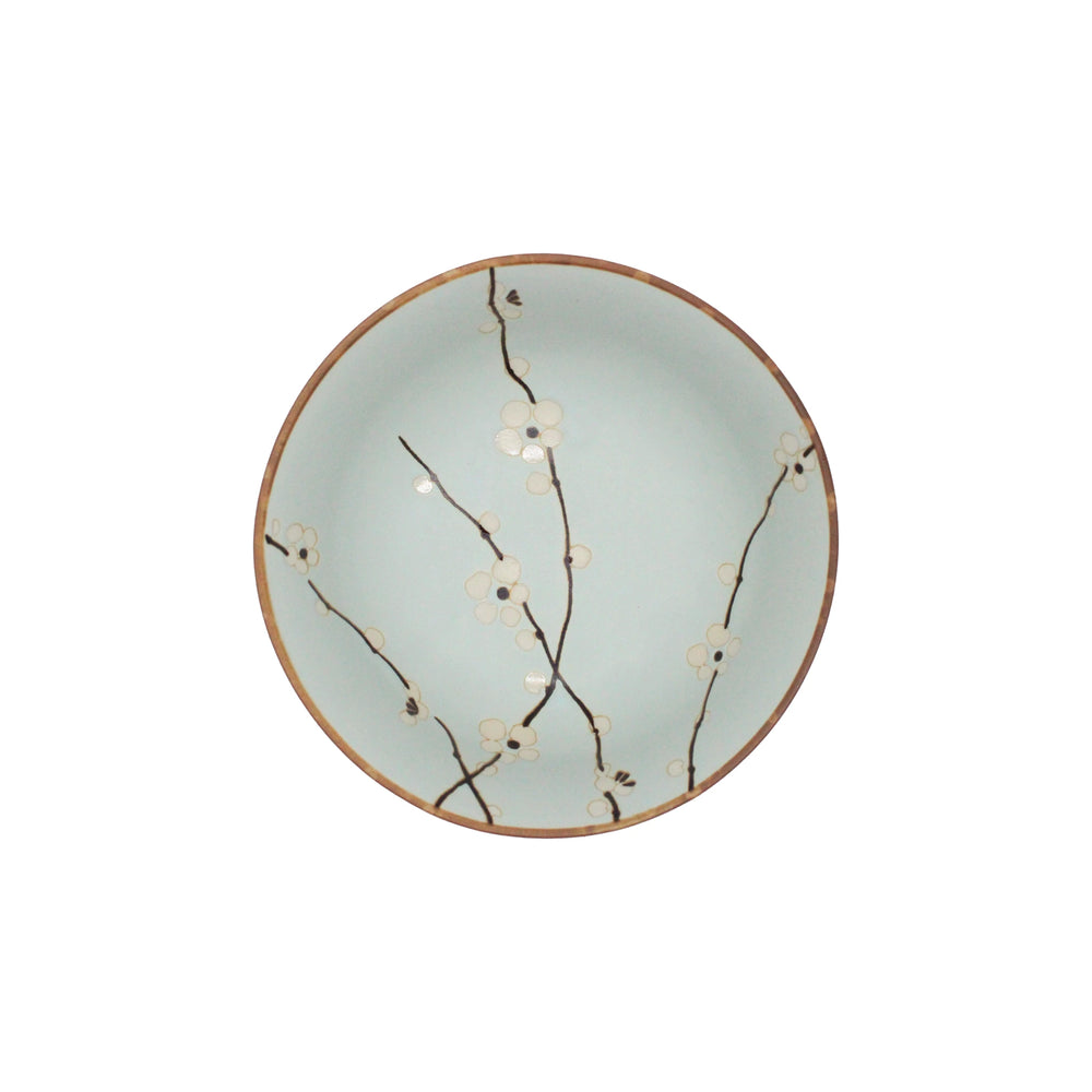 
                  
                    Ceramic udon bowl with floral design on a light blue background
                  
                