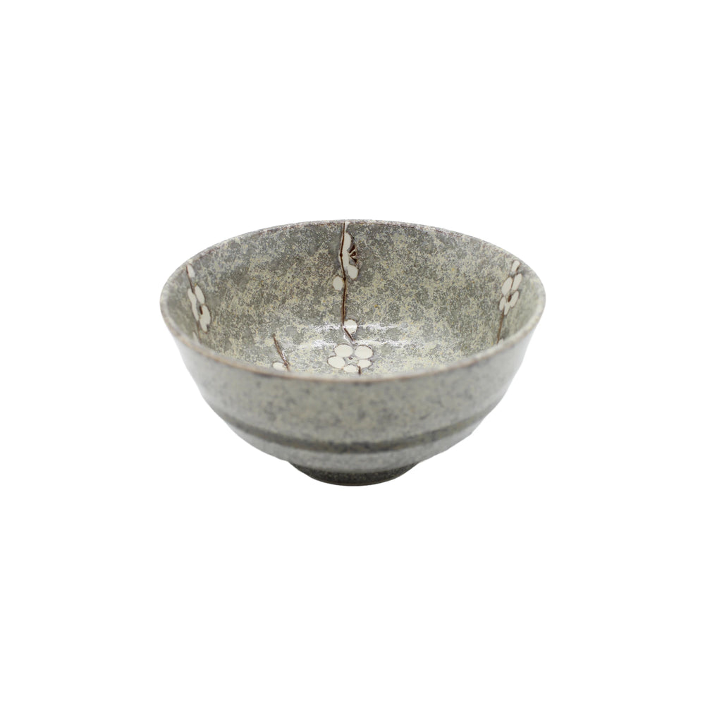 The Udon Bowl - Grey Cherry Blossom features a gray, speckled ceramic surface adorned with delicate white cherry blossom patterns inspired by Japanese art, shown on a plain white background.