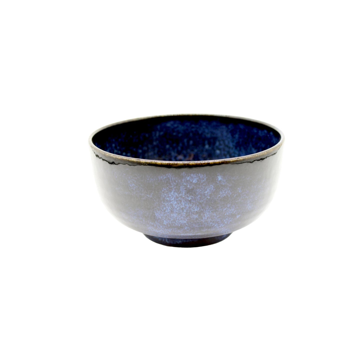 
                  
                    The Udon Bowl - Indigo Blue features a handcrafted design with a blue and purple glazed exterior, a dark blue interior, and is inspired by traditional Japanese porcelain udon bowls. Photographed on a white background.
                  
                