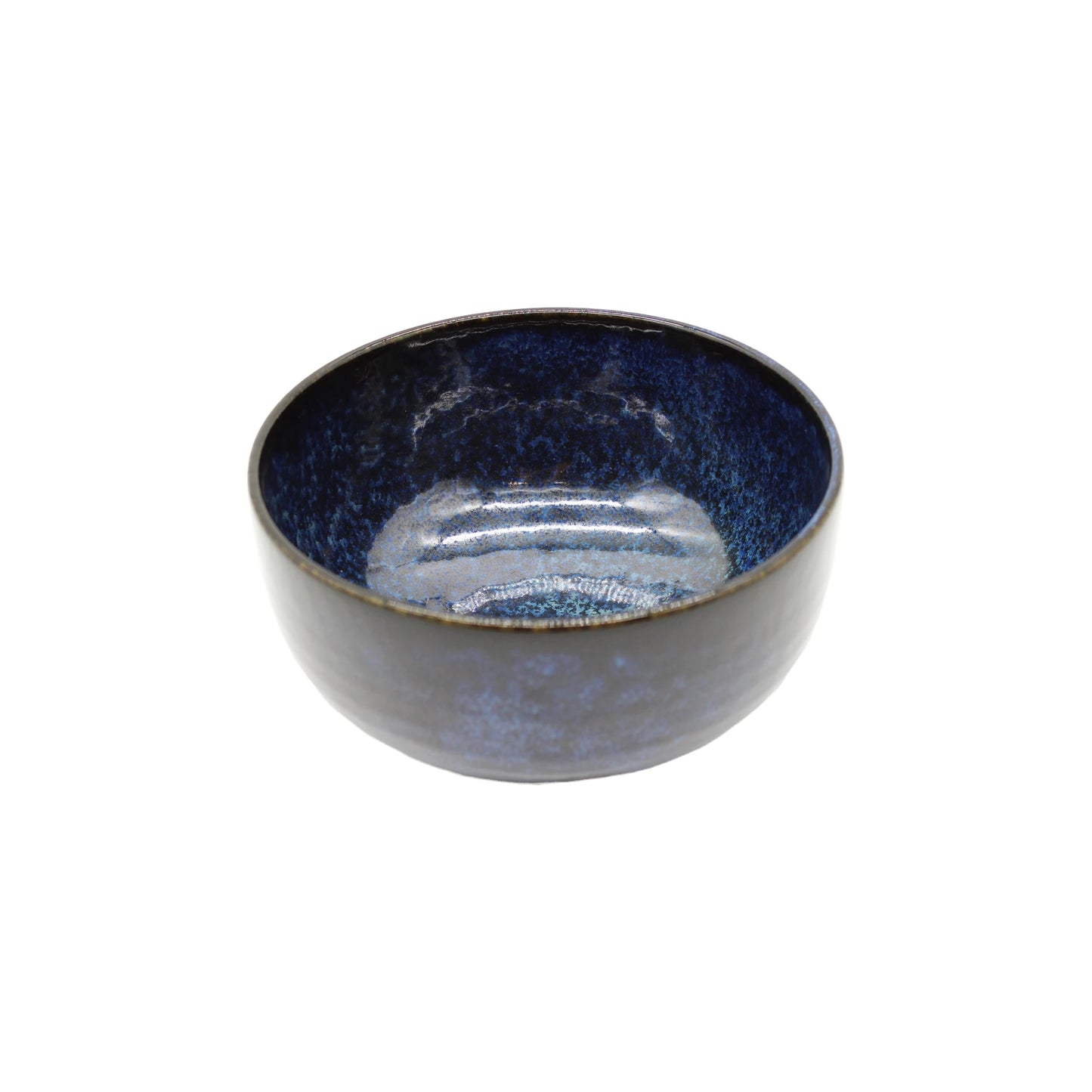 
                  
                    The Udon Bowl - Indigo Blue features a glossy dark blue interior and matte dark exterior, echoing the elegance of Japanese porcelain udon bowls. This handcrafted artisan piece stands out beautifully against a white background.
                  
                