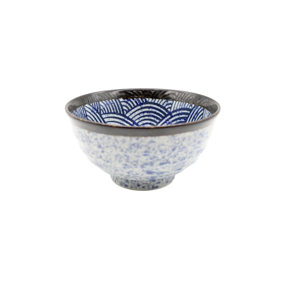 
                  
                    The Udon Bowl - Japanese Wave is a Japanese ceramic rice bowl with a blue wave design inside and a speckled blue exterior, displayed against a white background.
                  
                