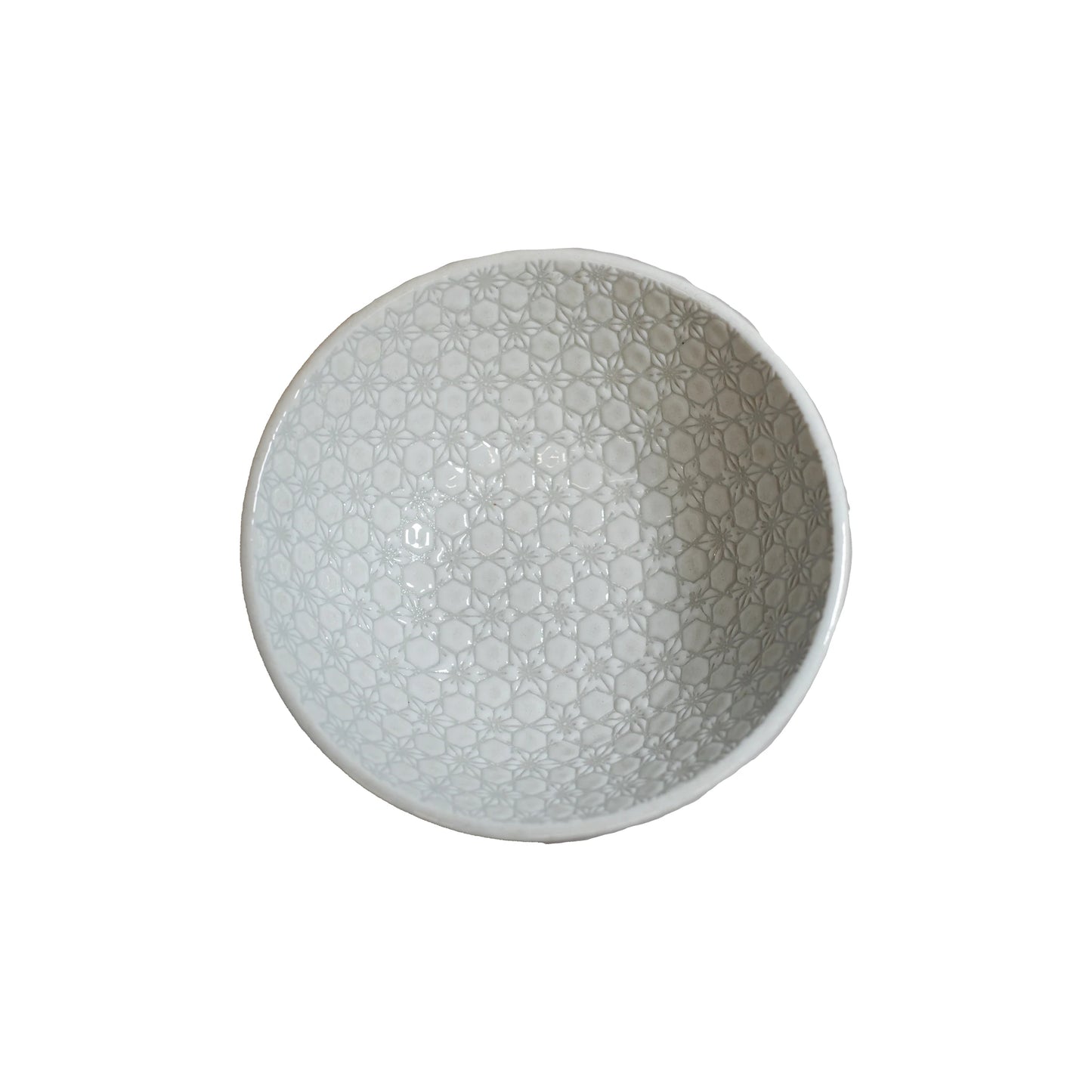 The Udon Bowl - White Star is a handmade white ceramic bowl featuring a textured geometric floral pattern inside, seen from above on a white background. It is microwave safe for everyday use.