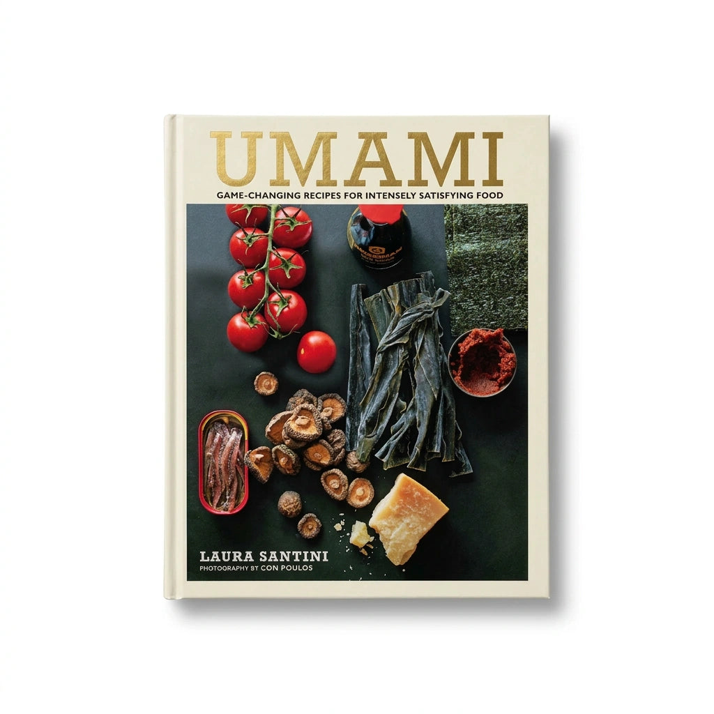 Hardcover cookbook Umami by Laura Santini, featuring photography of umami-rich ingredients like tomatoes, mushrooms, seaweed, anchovies, and cheese on the cover.