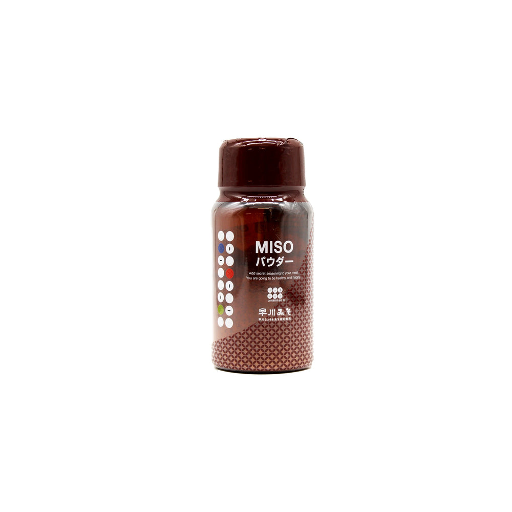 The Umami-so Miso Seasoning - 70g comes in a brown plastic container with white and colored dots, labeled “MISO パウダー,” and delivers natural umami miso flavor, photographed on a plain white background.