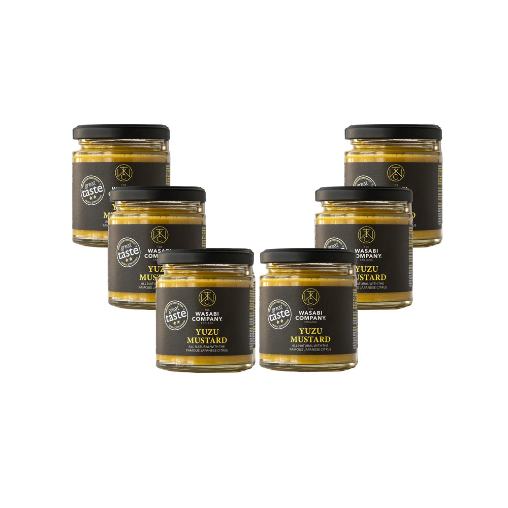 
                  
                    Six 175g jars of Yuzu Mustard, each with a black label and lid, are arranged in two rows on a white background. This Great Taste Award-winning mustard is known for its vibrant citrus flavor.
                  
                