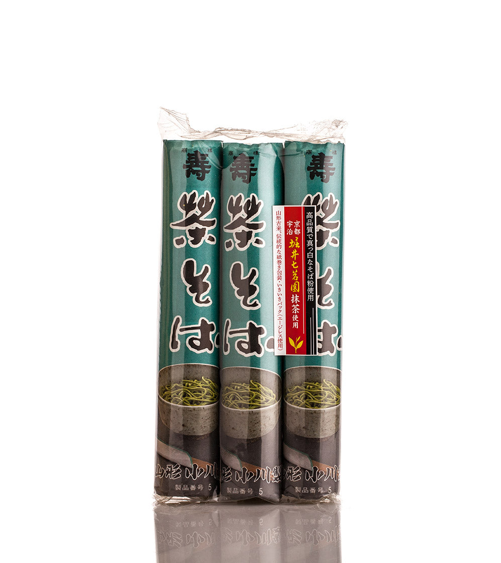 Buckwheat Noodles with Matcha - 3 x 160g: Three clear-wrapped bundles of nutrient-rich Japanese soba noodles with green and black labeling are displayed upright against a white background.