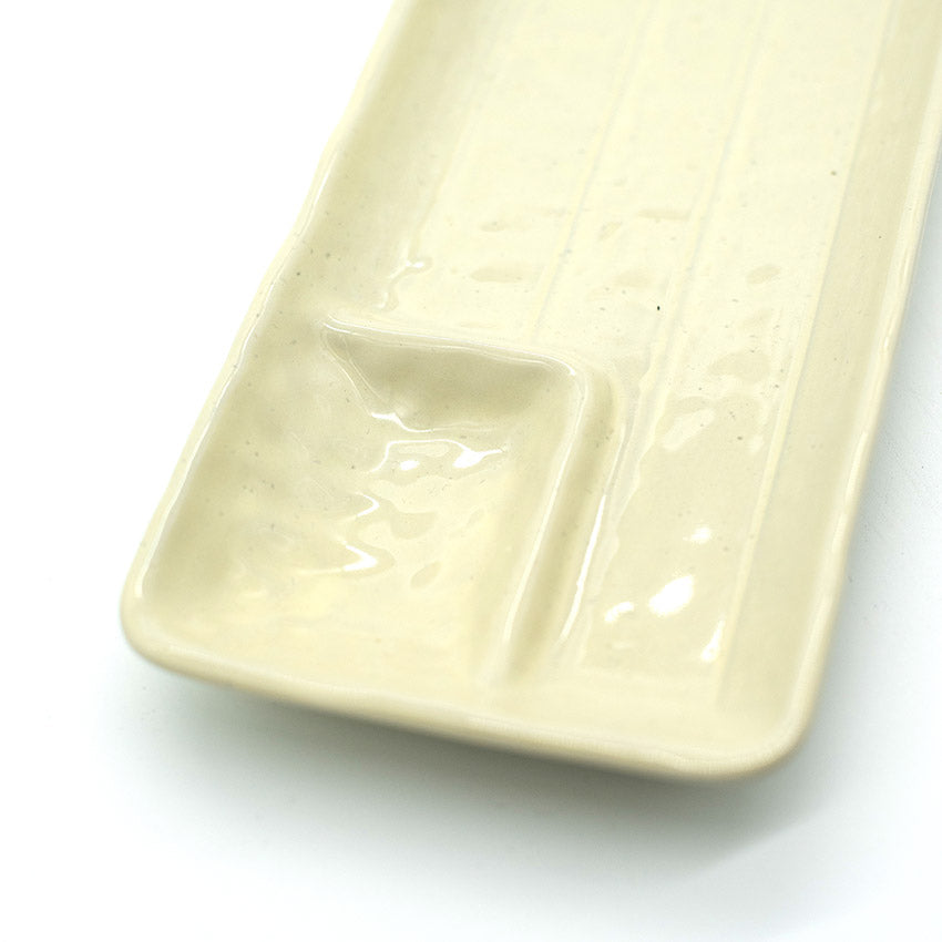
                  
                    Gyoza Plate in Ivory with Built-in Sauce Dish
                  
                