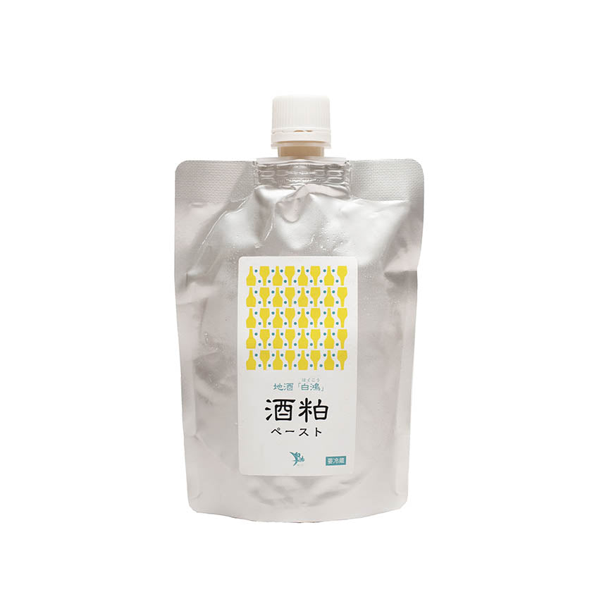 A silver pouch with a white cap and label showing yellow bottles and Japanese text contains Hakuko Sake Kasu Paste (sake lees) - 250g, adding rich umami flavor, displayed against a plain white background.