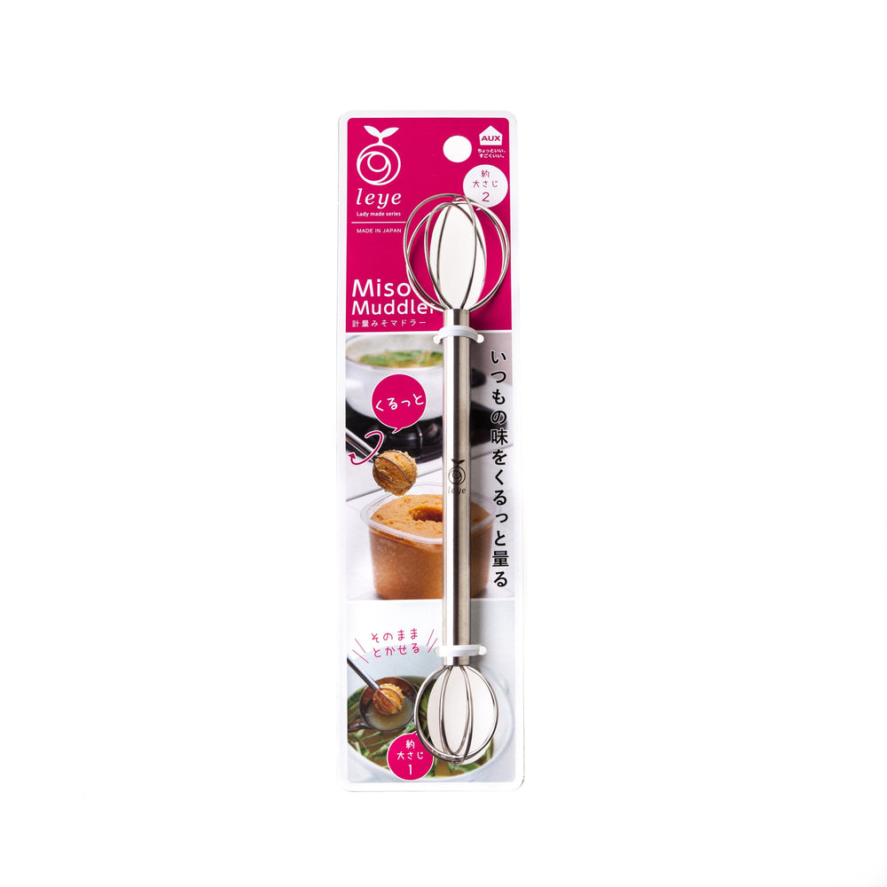 The Miso Muddler is a stainless steel kitchen tool with Japanese text and images on the packaging, ideal for effortlessly mixing miso paste into soups and sauces.