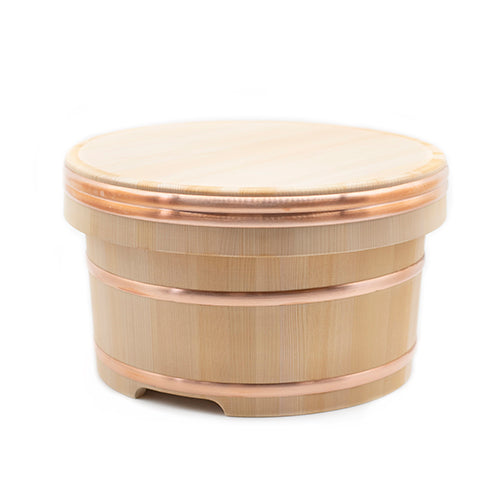 
                  
                    The Ohitsu Cypress Wood Rice Bowl with Lid is a round wooden container, often featuring copper bands, traditionally used for storing or serving sushi rice.
                  
                