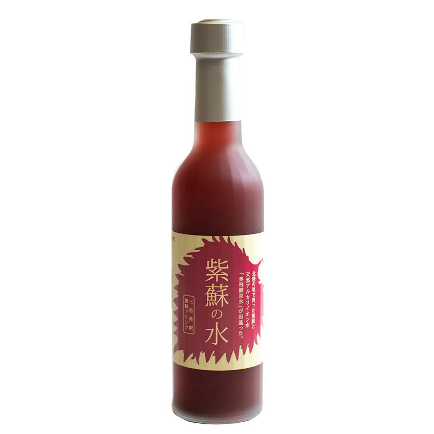 A 300ml glass bottle of Concentrated Shiso Syrup, filled with reddish syrup, sealed with a white cap, and adorned with a beige and red label featuring Japanese text.