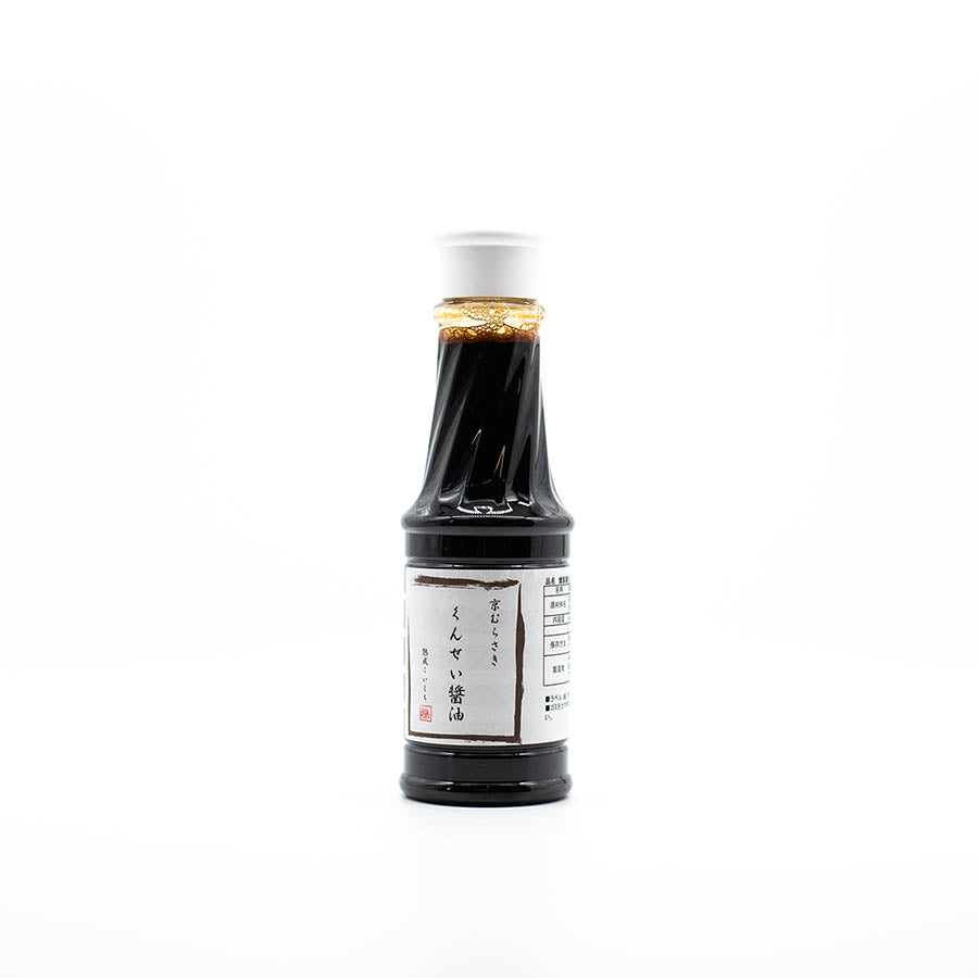 A 450ml bottle of Smoked Soy Sauce with a white label and gold foil on the neck, standing upright on a plain white background.