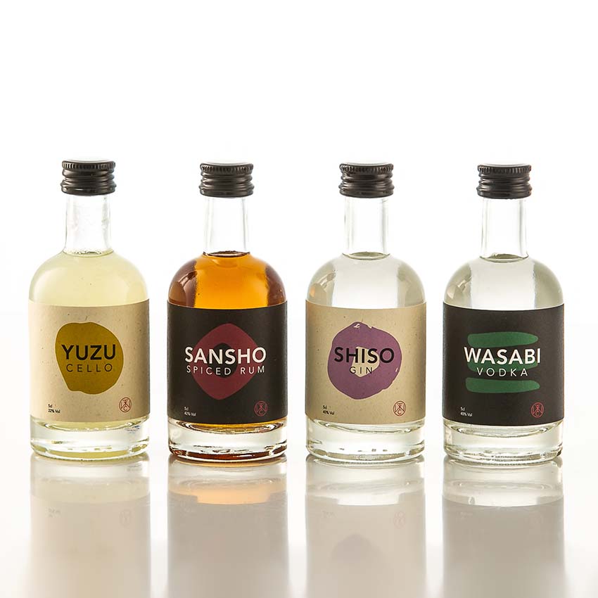 A small 5cl bottle labeled Yuzucello, featuring unique botanicals and citrus notes like yuzu liqueur, is displayed on a white background.