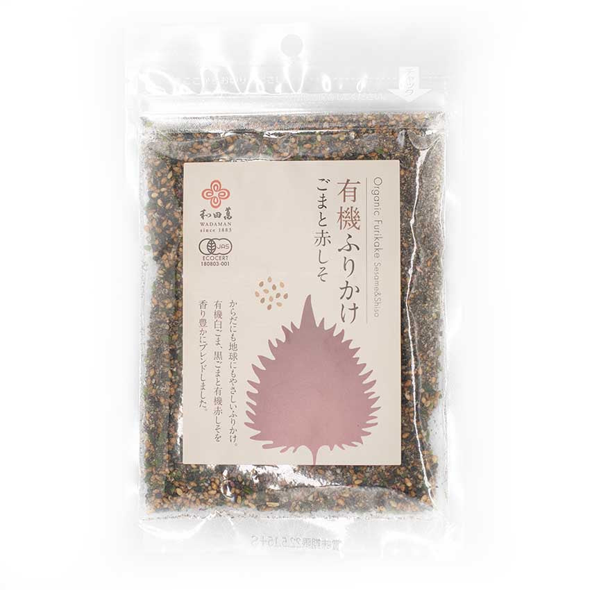 A clear plastic pouch of Wadaman Organic Furikake Sesame & Shiso - 30g, labeled in Japanese and English, features a leaf illustration and contains organic furikake seasoning with sesame seeds and red shiso.