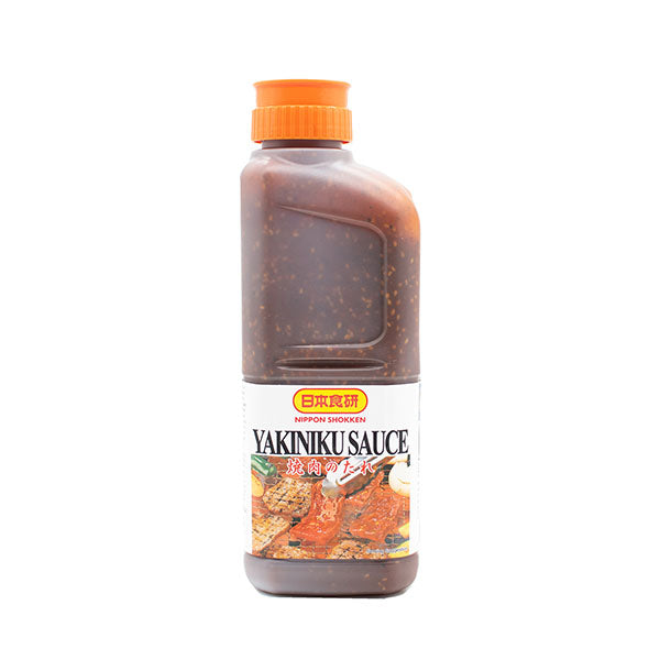 A 2kg plastic bottle of Yakiniku Barbecue Sauce with an orange cap and a grilled meat label, ideal for enhancing dishes with rich roasted sesame seed notes.
